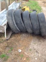 5 used 28575R24.5 tires (5)